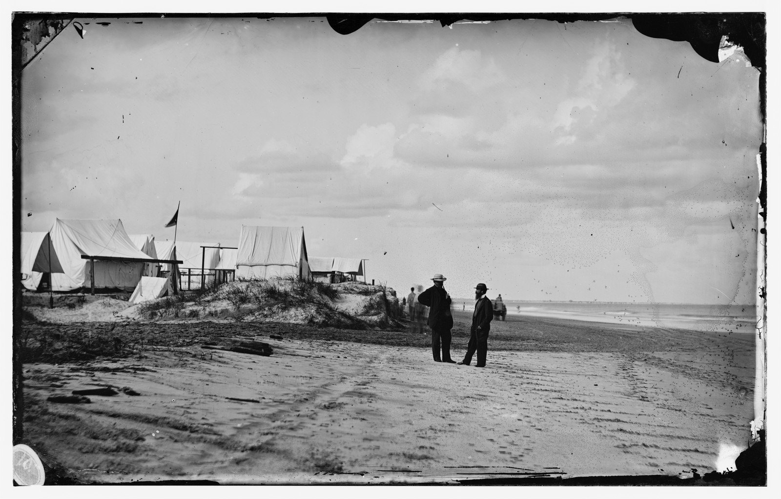 Two Men on the Beach Road